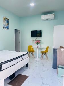 Μια τηλεόραση ή/και κέντρο ψυχαγωγίας στο Sunshine guesthouse