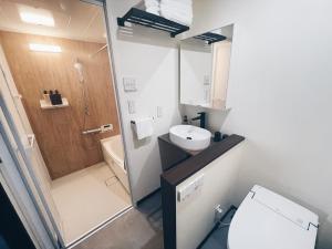 Koupelna v ubytování Plan A Tennozu Isle + 7 fotografií