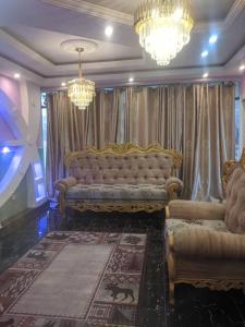 Χώρος καθιστικού στο Dynamic Guest House Buea