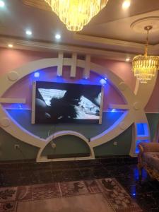 Μια τηλεόραση ή/και κέντρο ψυχαγωγίας στο Dynamic Guest House Buea