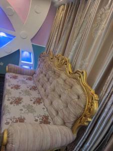 Ένα ή περισσότερα κρεβάτια σε δωμάτιο στο Dynamic Guest House Buea