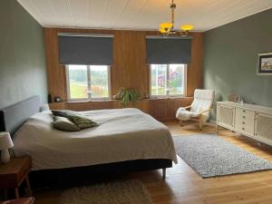Ένα ή περισσότερα κρεβάτια σε δωμάτιο στο Historic Country Home in Alberga