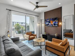 a living room with a couch and chairs at Thunderbird - 4 Units - Jacuzzi - In Old Town in Scottsdale