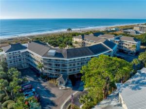 an aerial view of a hotel and the beach at 328 Breakers Oceanfront Hilton Head Condo Amazing Ocean Beach View Heated Pool & Family-Friendly in Hilton Head Island