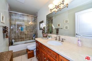 a bathroom with a sink and a toilet at Beautiful, Spacious Agoura Malibu Zen House in Agoura Hills +27 photos