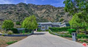 a house with a mountain in the background at Beautiful, Spacious Agoura Malibu Zen House in Agoura Hills
