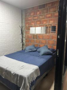 Ένα ή περισσότερα κρεβάτια σε δωμάτιο στο ciudad del campo