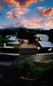 a view of a building with a parking lot at Villas Na-tiva Guanacaste in Plazuela +48 photos