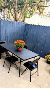 a table with a potted plant on top of it at Luxury 2bedrooms 1bath home near philly museum Temple and center city in Philadelphia