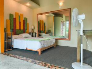 En eller flere senge i et værelse på Departamentos paraiso de adan1