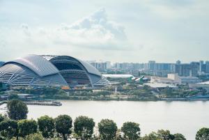 a view of the sydney opera house and the river at Hotel Traveltine Downtown Singapore, Trademark Collection in Singapore
