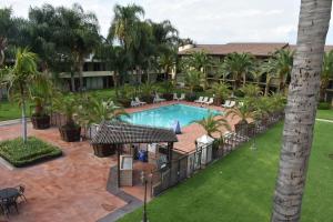an aerial view of a resort with a swimming pool at Ontario Airport Inn in Ontario