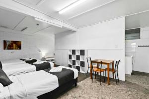 Postel nebo postele na pokoji v ubytování Maryborough City Motel