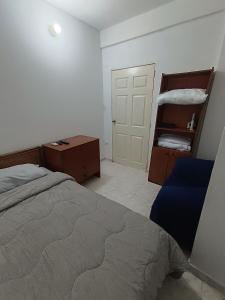 Postel nebo postele na pokoji v ubytování Mini apartamento 2 habitaciones + 10 fotografií