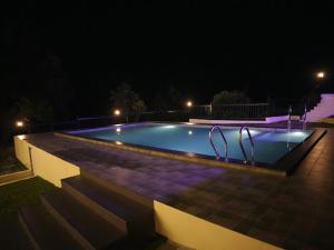 Bazén v ubytování Vandhanam Stays nebo v jeho okolí + 3 fotografie