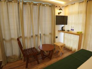 Kuchyň nebo kuchyňský kout v ubytování Vandhanam Stays