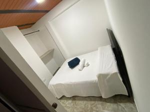 Ένα ή περισσότερα κρεβάτια σε δωμάτιο στο Casa la esquina