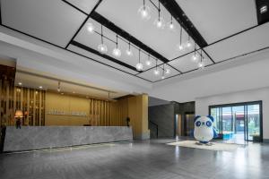 Vstupní hala nebo recepce v ubytování 博雅酒店张家界国家森林公园店
