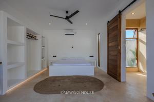 Postel nebo postele na pokoji v ubytování East Africa Boho Beach Paradise - Diani + 17 fotografií