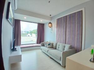 TV a/nebo společenská místnost v ubytování Agrowth at Sky Suites