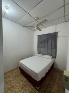 Ένα ή περισσότερα κρεβάτια σε δωμάτιο στο Room in Guests House Veracruz