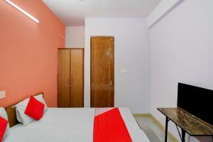 TV a/nebo společenská místnost v ubytování Hotel O Wamson Living Classic + 17 fotografií