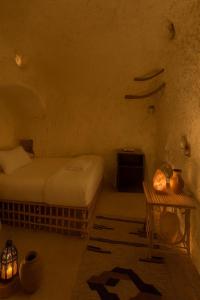 Ένα ή περισσότερα κρεβάτια σε δωμάτιο στο Soléi Salt Caves +8 φωτογραφίες