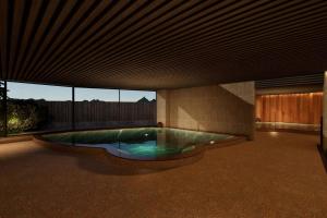 Πισίνα στο ή κοντά στο Ooedo Onsen Monogatari Premium Enakyo
