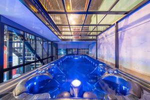 Bazén v ubytování Muju Central Resort Pension nebo v jeho okolí