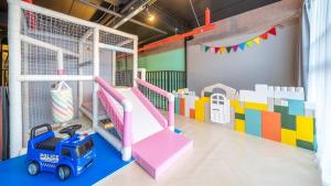 Dětský klub v ubytování Muju Central Resort Pension