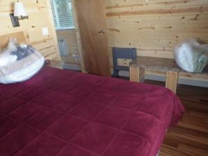 Postel nebo postele na pokoji v ubytování Seaside Camping Resort Cottage 9 + 6 fotografií