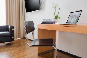 TV in/ali zabaviščno središče v nastanitvi GLANDON Rooms Elite