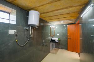 a bathroom with a shower and a sink at The Saffron Desert Camp, Jaisalmer in Jaisalmer +42 photos