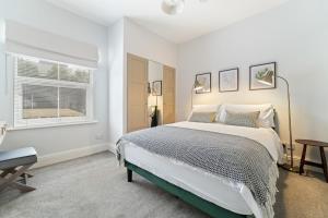 Postel nebo postele na pokoji v ubytování Stables End House