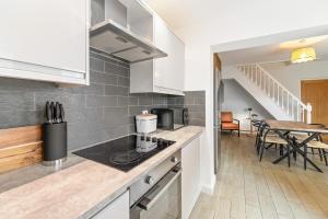 Kuchyň nebo kuchyňský kout v ubytování Stables End House