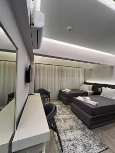 Ένα ή περισσότερα κρεβάτια σε δωμάτιο στο The Museum Of The Pyramids