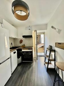 Dapur atau dapur kecil di Appartement Centrale Confort