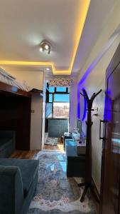 a living room with a couch and a table at Super Elite apartment - Aswan city center apartments in Aswan +56 photos
