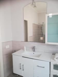 Koupelna v ubytování Conte Pace apartment