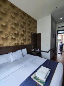 ブキティンギにあるAura Syaria Guest Houseのギャラリーの写真