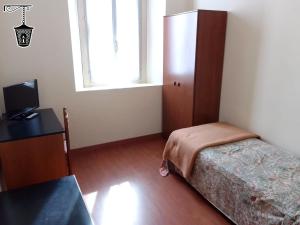 Ένα ή περισσότερα κρεβάτια σε δωμάτιο στο Hotel La Lanterna