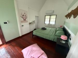 Postel nebo postele na pokoji v ubytování Vanara Bungalows