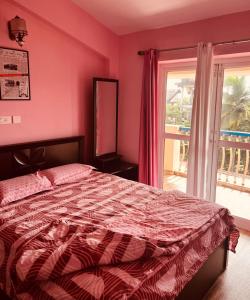 Ένα ή περισσότερα κρεβάτια σε δωμάτιο στο Cozy 3BHK Apartment near Zalor Beach , Goa Getaway