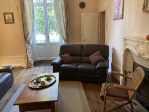 Posezení v ubytování Gite du theil au servant