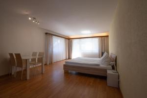 Postel nebo postele na pokoji v ubytování Casa Viva Bad Ragaz
