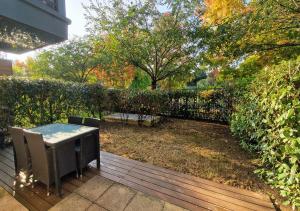 Zahrada ubytování Appartement avec jardin - Claye-Souilly + 1 fotografie