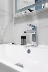 Ένα μπάνιο στο En Centre ville Gare et commerces