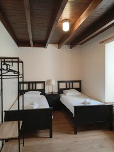 Ένα ή περισσότερα κρεβάτια σε δωμάτιο στο Chambre dans un gîte de Château de l'Estang