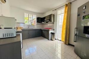 Η κουζίνα ή μικρή κουζίνα στο Koala West Coast Escape