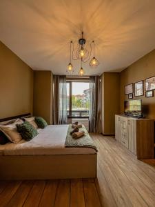 Postel nebo postele na pokoji v ubytování Tarein Studio + 30 fotografií